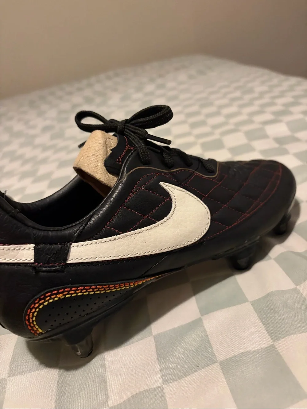 Nike Men’s Black Athletic Shoes with White Swoosh and Yellow/Red Insole